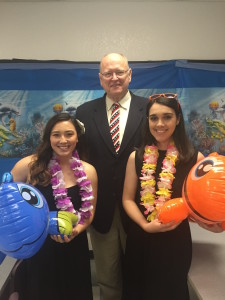My partner Sam and I took a picture with Dr. Rice after our presentation! We decorated the classroom and dressed up as if we were going to the beach.